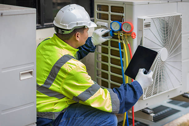 Professional Hvac technician working in Quincy, MA